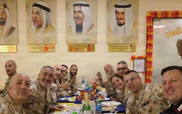 Soldiers are served Thanksgiving dinner at Camp Arifjan, Kuwait