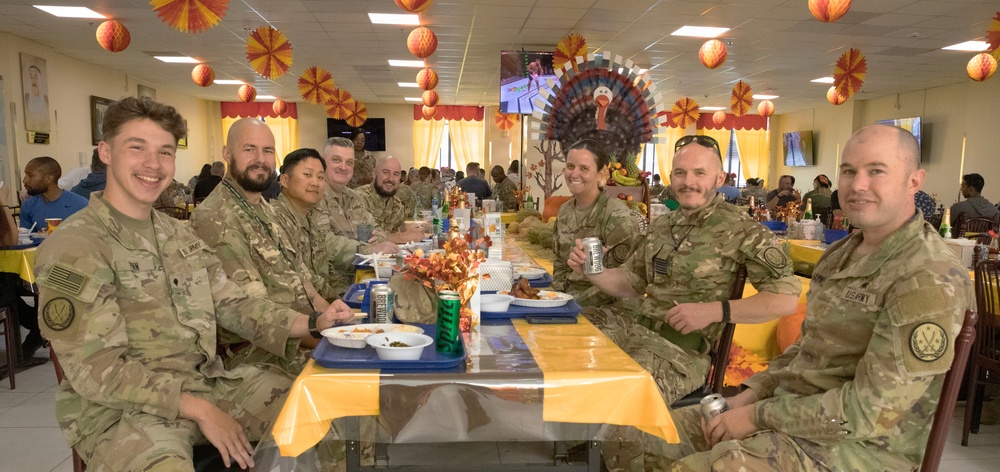 Soldiers are served Thanksgiving dinner at Camp Arifjan, Kuwait