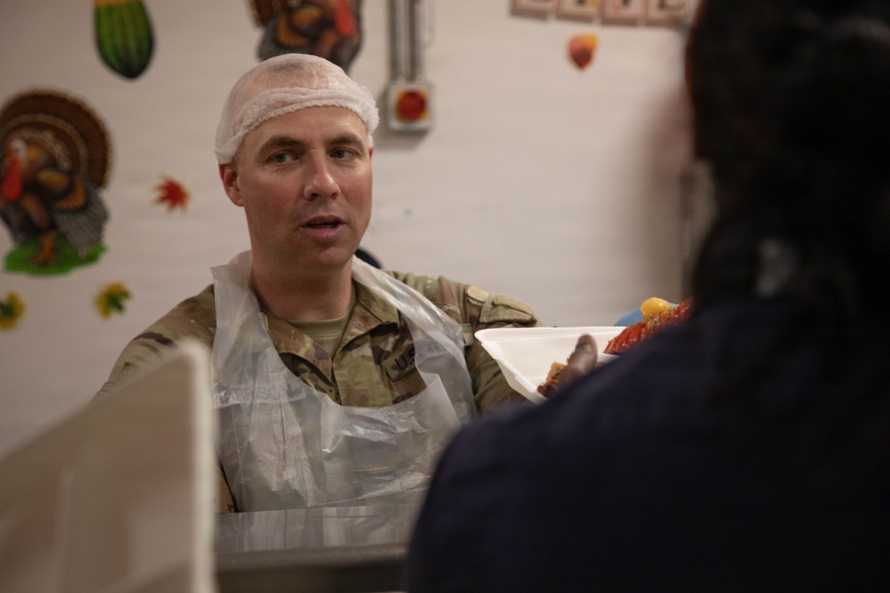 Soldiers are served up a Thanksgiving Meal courtesy of DFACs and Leadership