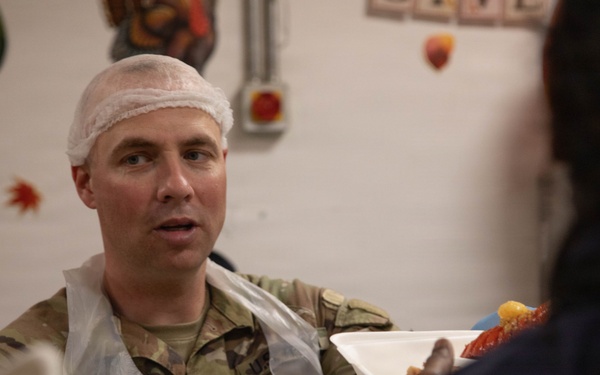 Soldiers are served up a Thanksgiving Meal courtesy of DFACs and Leadership