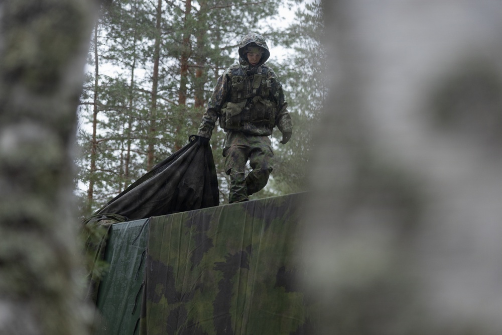 Finnish service members, U.S. Marines execute a joint convoy operation