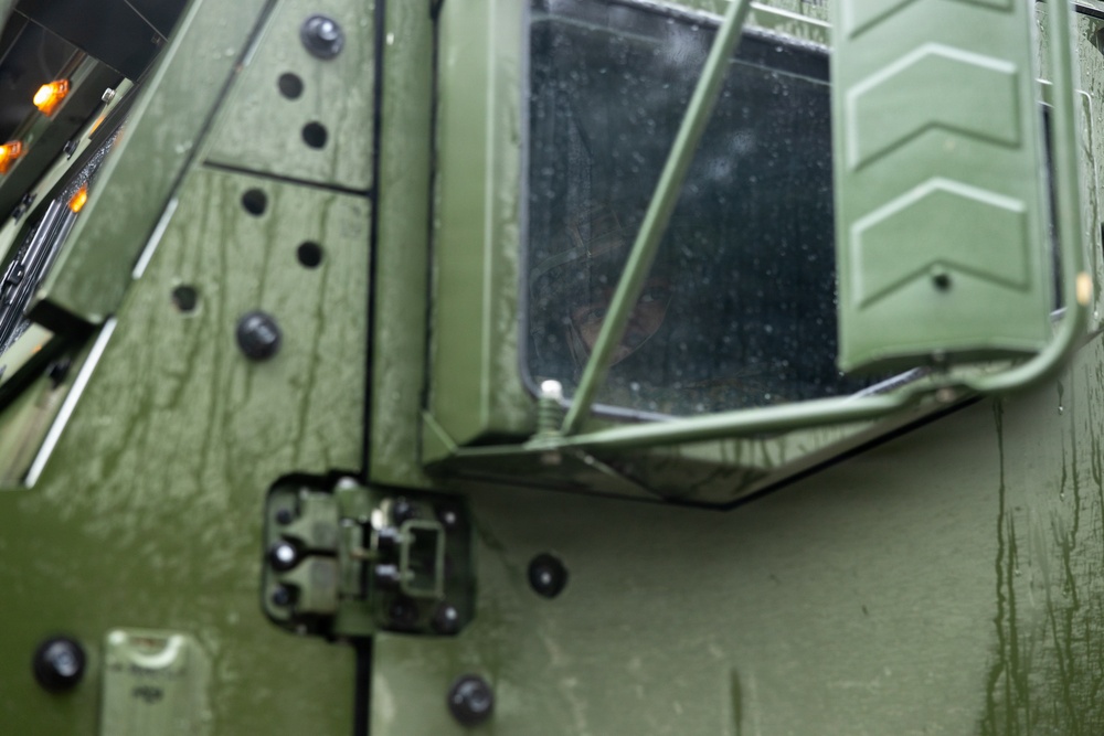 Finnish service members, U.S. Marines execute a joint convoy operation