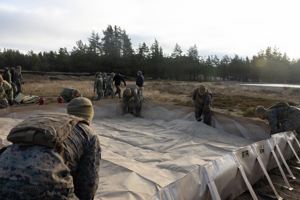 U.S. Marines, Sailors set up a forward arming and refueling point supporting Finnish Defense Forces