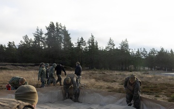 U.S. Marines, Sailors set up a forward arming and refueling point supporting Finnish Defense Forces