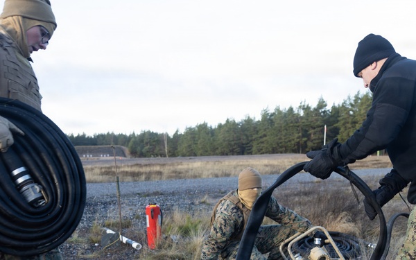 U.S. Marines, Sailors set up a forward arming and refueling point supporting Finnish Defense Forces