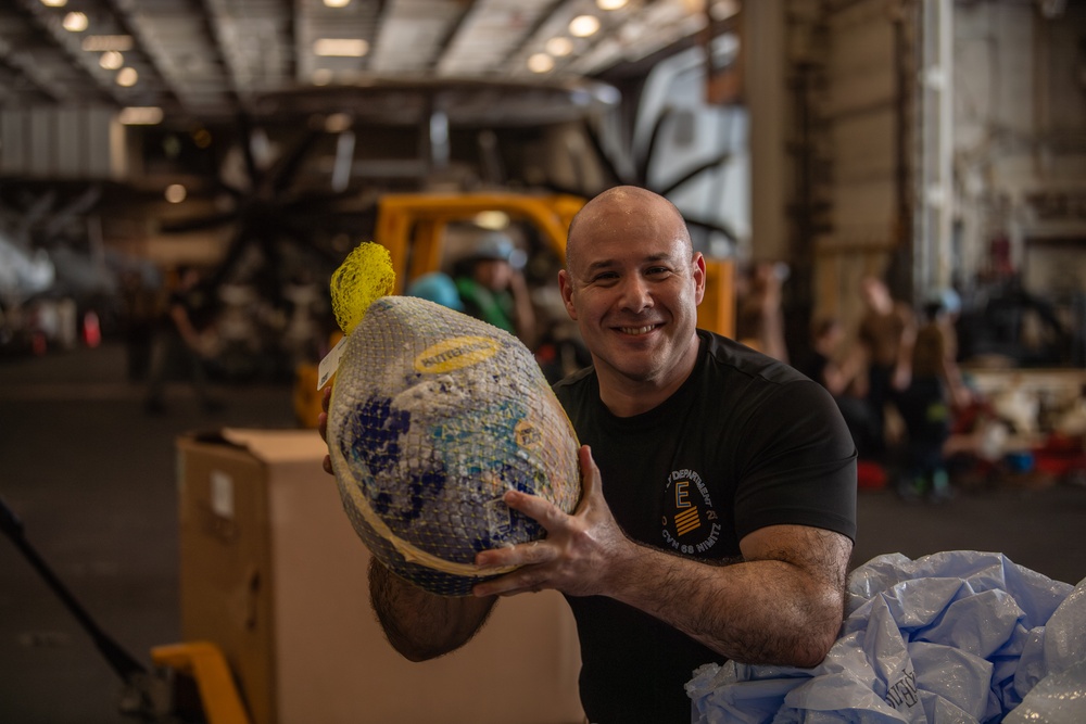 Nimitz Sailors Conduct a Replenishment-at-Sea in Preparation for Thanksgiving