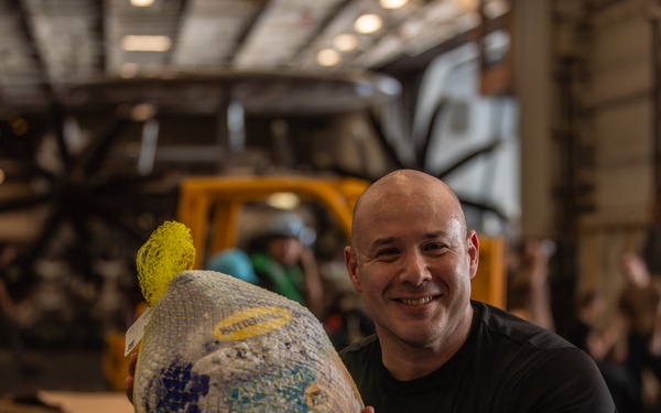 Nimitz Sailors Conduct a Replenishment-at-Sea in Preparation for Thanksgiving