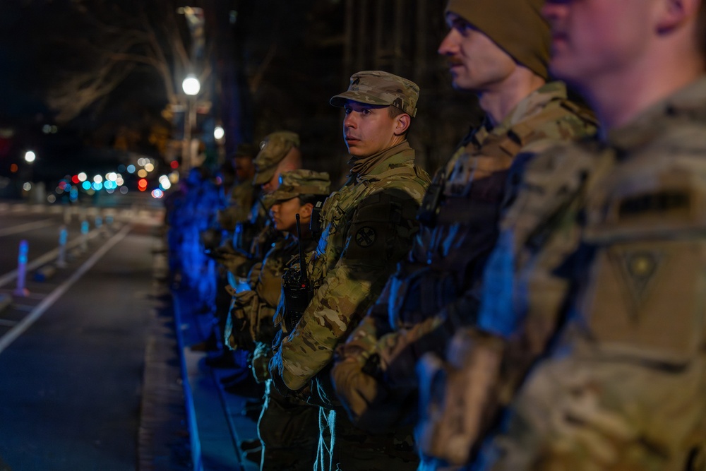 They Stand So She May Be Remembered