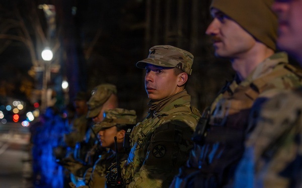 They Stand So She May Be Remembered