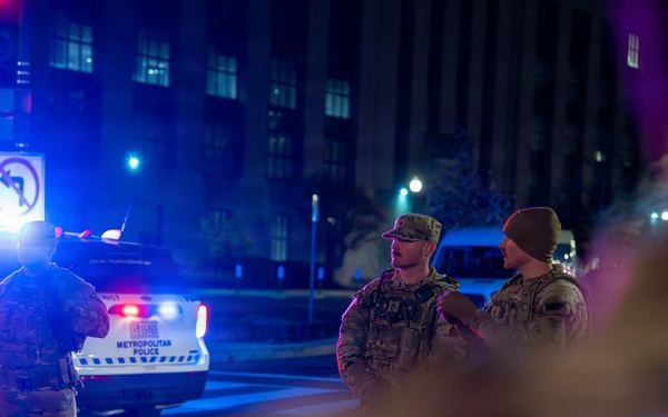 They Stand So She May Be Remembered