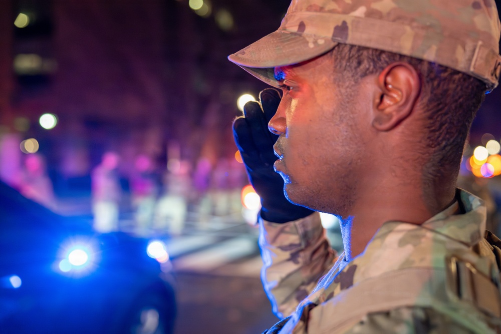 They Stand So She May Be Remembered