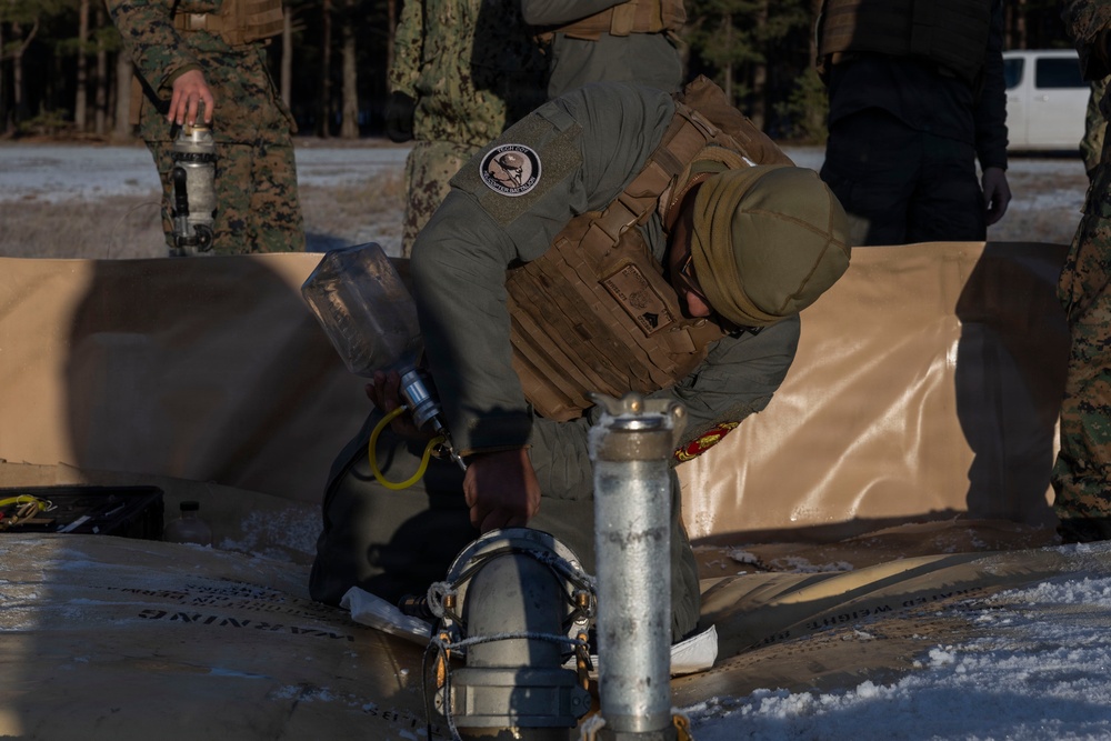 U.S. Marines, Sailors set up a forward arming and refueling point supporting Finnish Defense Forces