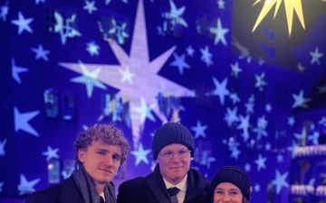 USAG Stuttgart Commander Col. Edward Sanford, joined by his wife and son, attends the opening of the Stuttgart Christmas Market on Nov. 26, 2025.