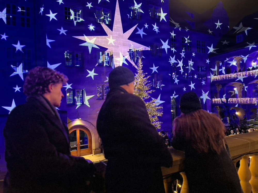 USAG Stuttgart Commander Col. Edward Sanford, joined by his wife and son, attends the opening of the Stuttgart Christmas Market on Nov. 26, 2025.
