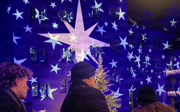 USAG Stuttgart Commander Col. Edward Sanford, joined by his wife and son, attends the opening of the Stuttgart Christmas Market on Nov. 26, 2025.