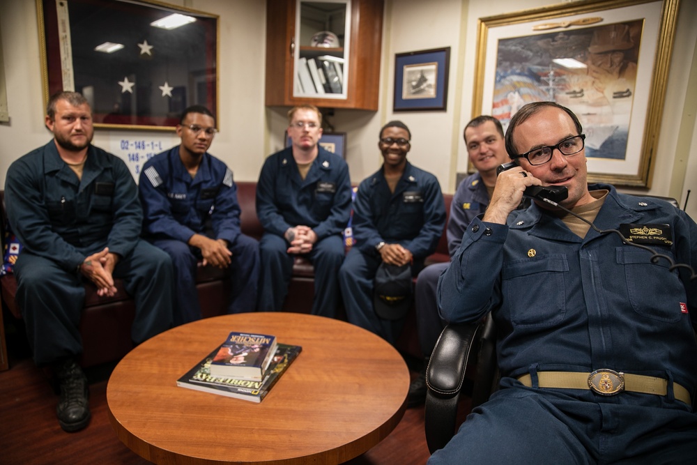 USS Mitscher (DDG 57) CO speaks on phone with U.S. Navy CNO