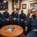 USS Mitscher (DDG 57) CO speaks on phone with U.S. Navy CNO