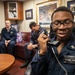 USS Mitscher (DDG 57) Sailor speaks on phone with U.S. Chief of Naval Operations