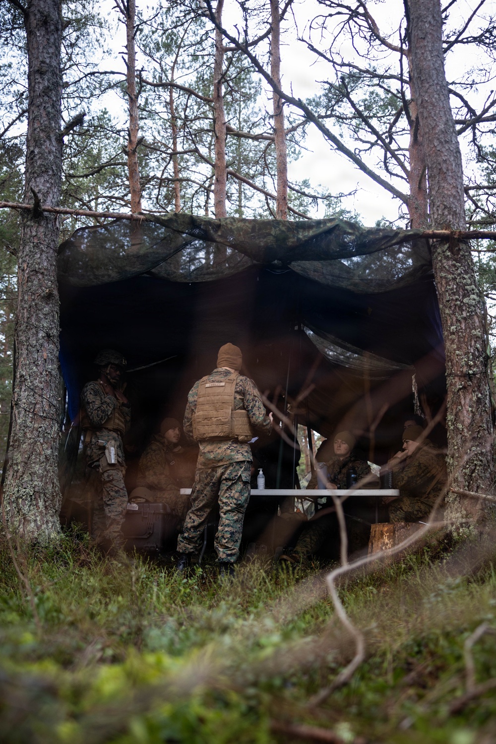 U.S. Navy chaplain prays with Marines and Sailors during European deployment