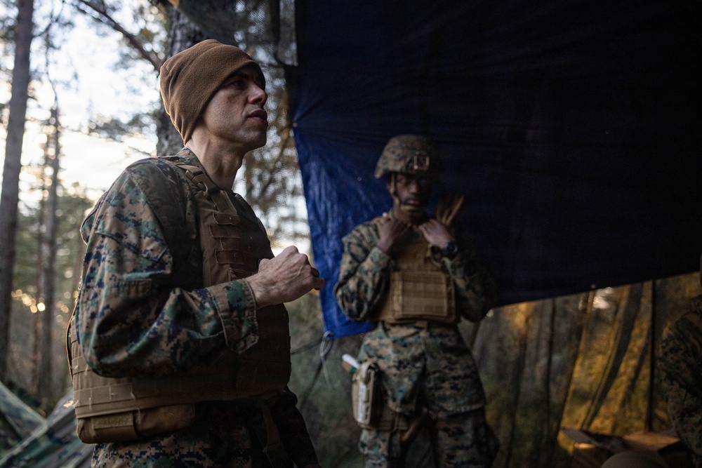 U.S. Navy chaplain prays with Marines and Sailors during European deployment