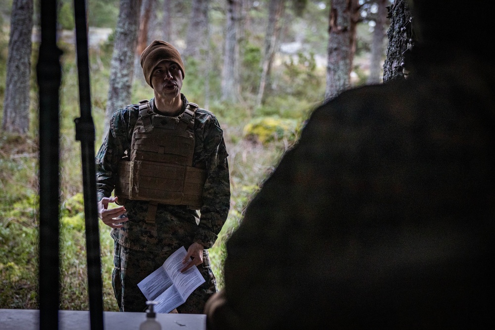 U.S. Navy chaplain prays with Marines and Sailors during European deployment