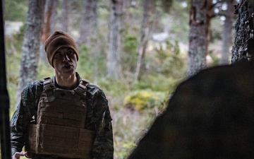 U.S. Navy chaplain prays with Marines and Sailors during European deployment