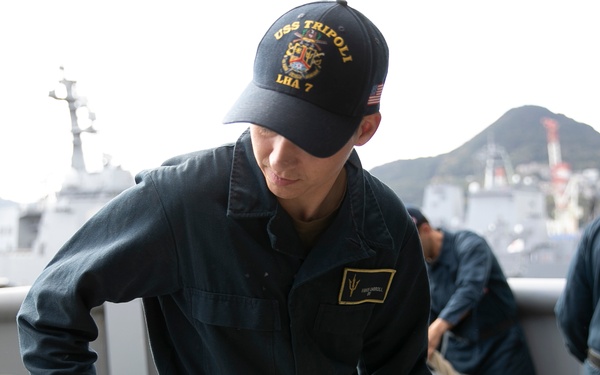 USS Tripoli Sailors Get Underway