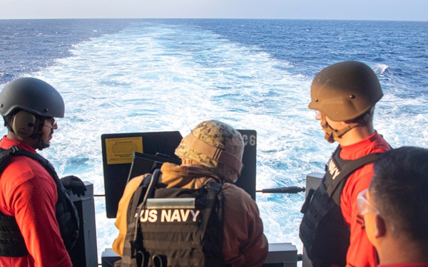 USS Tripoli Conducts Weapons Training