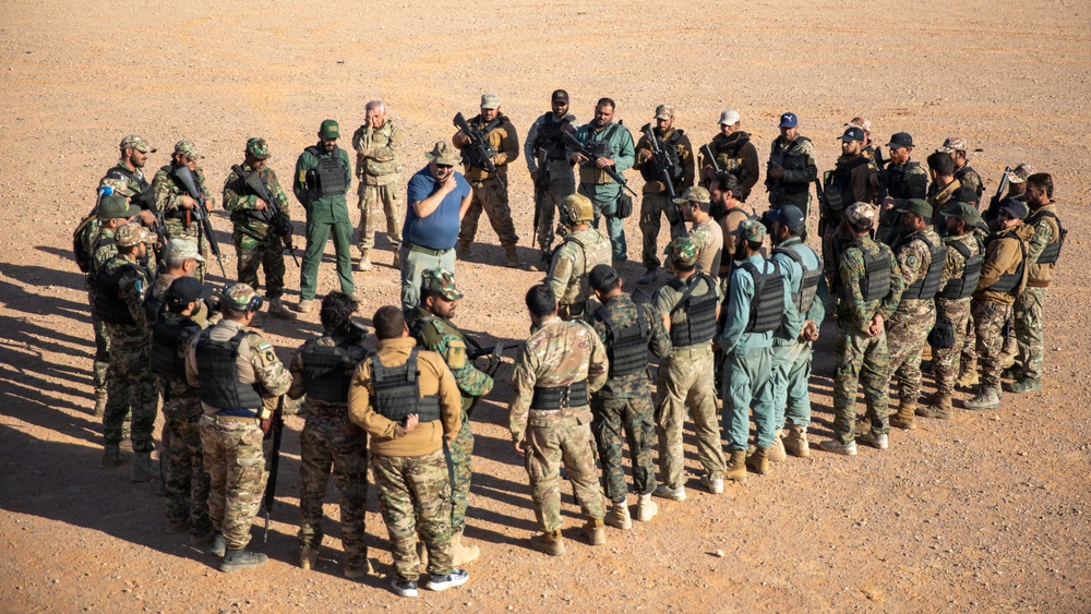 U.S. and Partner Forces Conduct Weapons Range Training