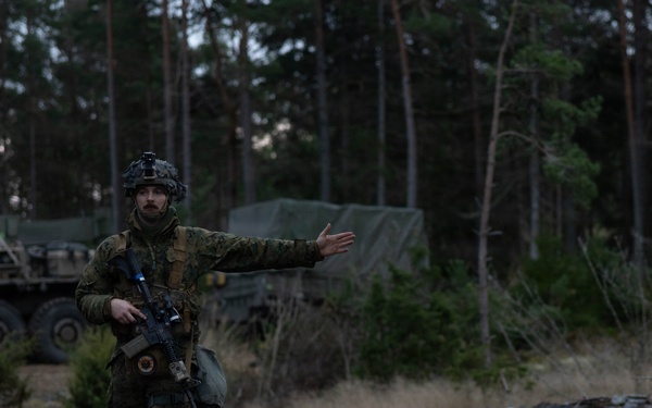 U.S. Marines establish a secured area during a bilateral exercise while deployed in the Baltic sea
