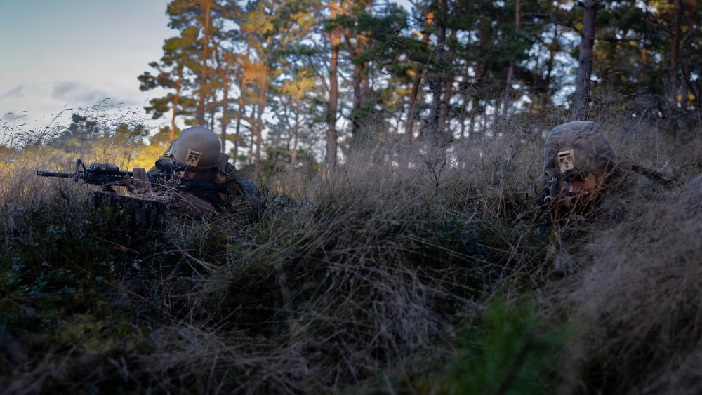 U.S. Marines establish a secured area during a bilateral exercise while deployed in the Baltic sea