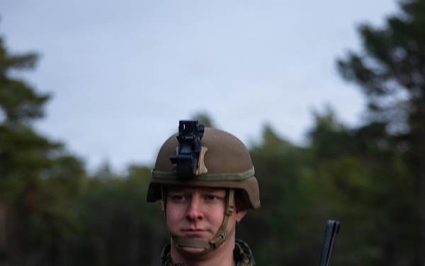 U.S. Marines establish a secured area during a bilateral exercise while deployed in the Baltic sea