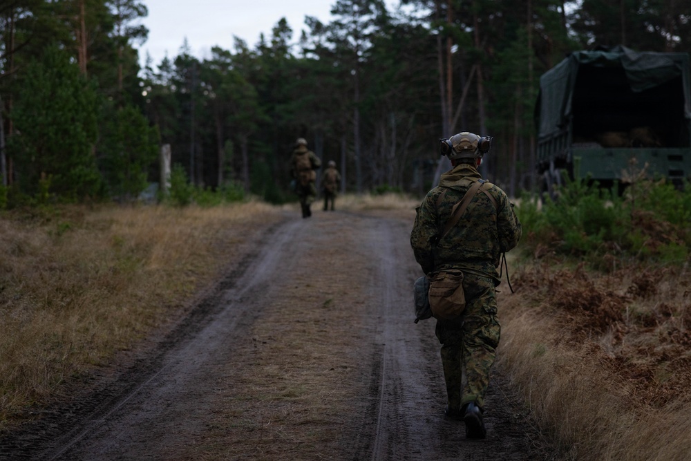 U.S. Marines establish a secured area during a bilateral exercise while deployed in the Baltic sea