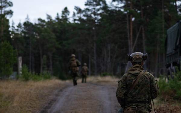 U.S. Marines establish a secured area during a bilateral exercise while deployed in the Baltic sea