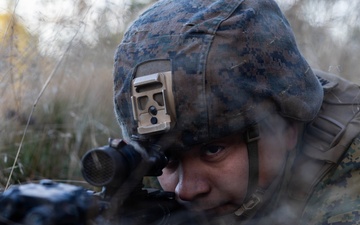 U.S. Marines establish a secured area during a bilateral exercise while deployed in the Baltic sea