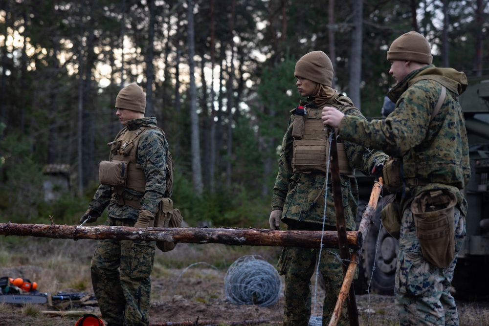 U.S. Marines build road barriers while deployed in the Baltic sea area