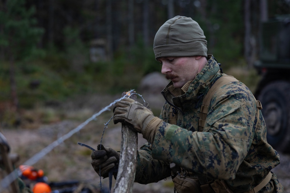 U.S. Marines build road barriers while deployed in the Baltic sea area