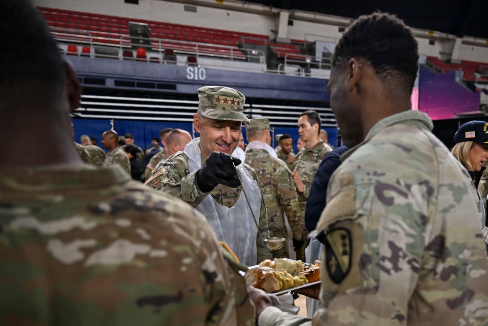 Secretary of War Serves National Guardsmen a Thanksgiving Meal