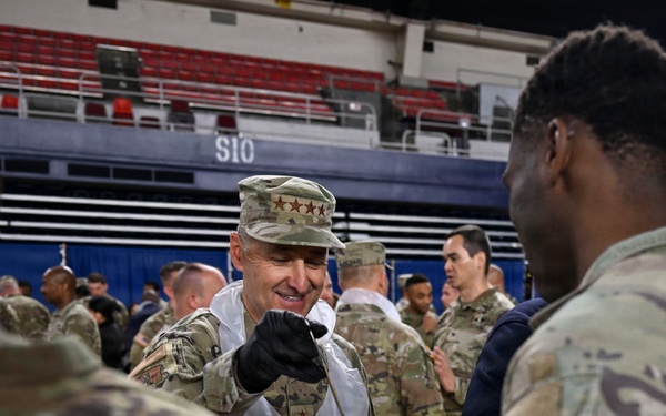 Secretary of War Serves National Guardsmen a Thanksgiving Meal