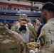 Secretary of War Serves National Guardsmen a Thanksgiving Meal