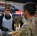 Secretary of War Serves National Guardsmen a Thanksgiving Meal