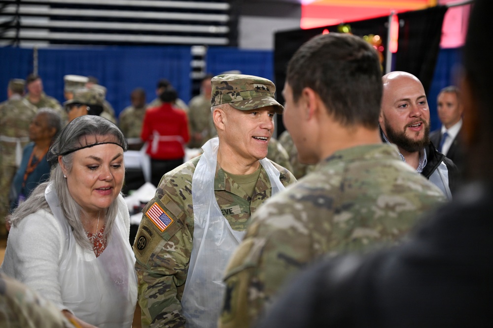Secretary of War Serves National Guardsmen a Thanksgiving Meal