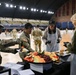 Secretary of War Serves National Guardsmen a Thanksgiving Meal