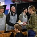 Secretary of War Serves National Guardsmen a Thanksgiving Meal