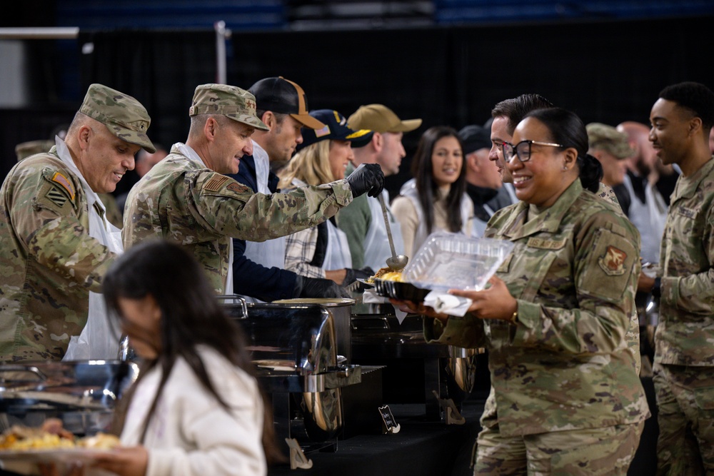 Secretary of War Serves National Guardsmen a Thanksgiving Meal