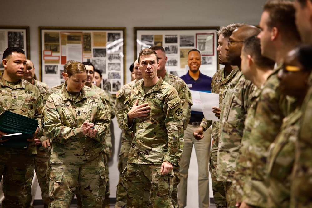 66th Military Intelligence Brigade recognizes Soldiers with coins and AAMs for outstanding achievements during Avenger Triad 25.