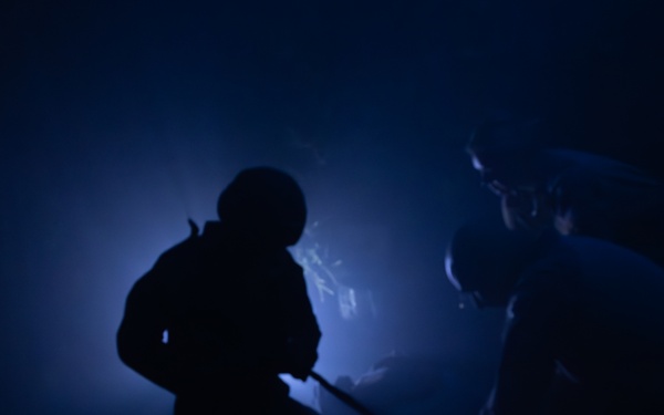 U.S. Navy Hospital Corpsman participate in the culminating event of a Combat Medical Course