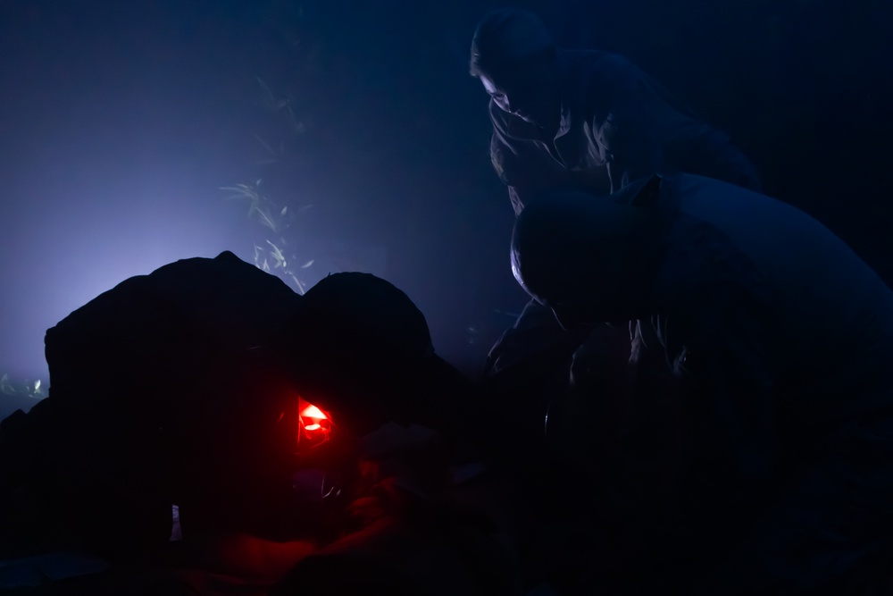 U.S. Navy Hospital Corpsman participate in the culminating event of a Combat Medical Course