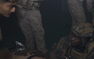 U.S. Navy Hospital Corpsman participate in the culminating event of a Combat Medical Course