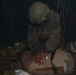 U.S. Navy Hospital Corpsman participate in the culminating event of a Combat Medical Course